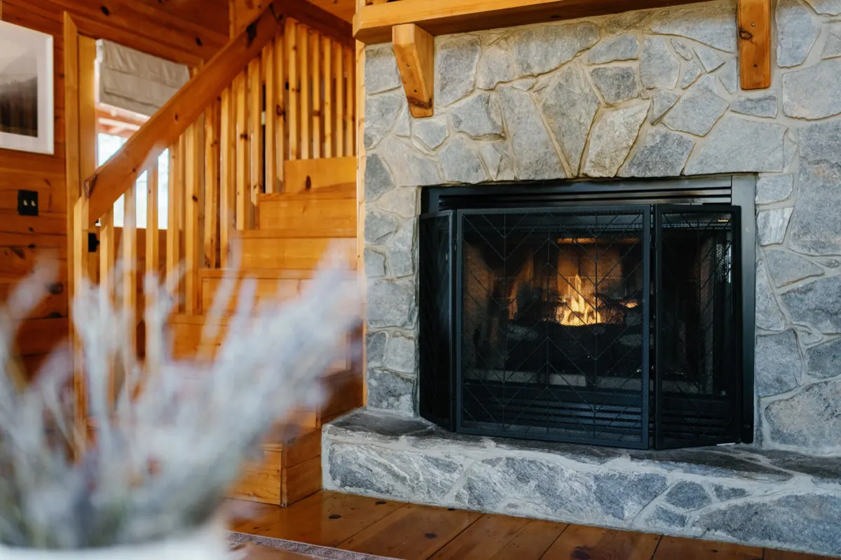 Get cozy in front of our gas log fireplace available all year