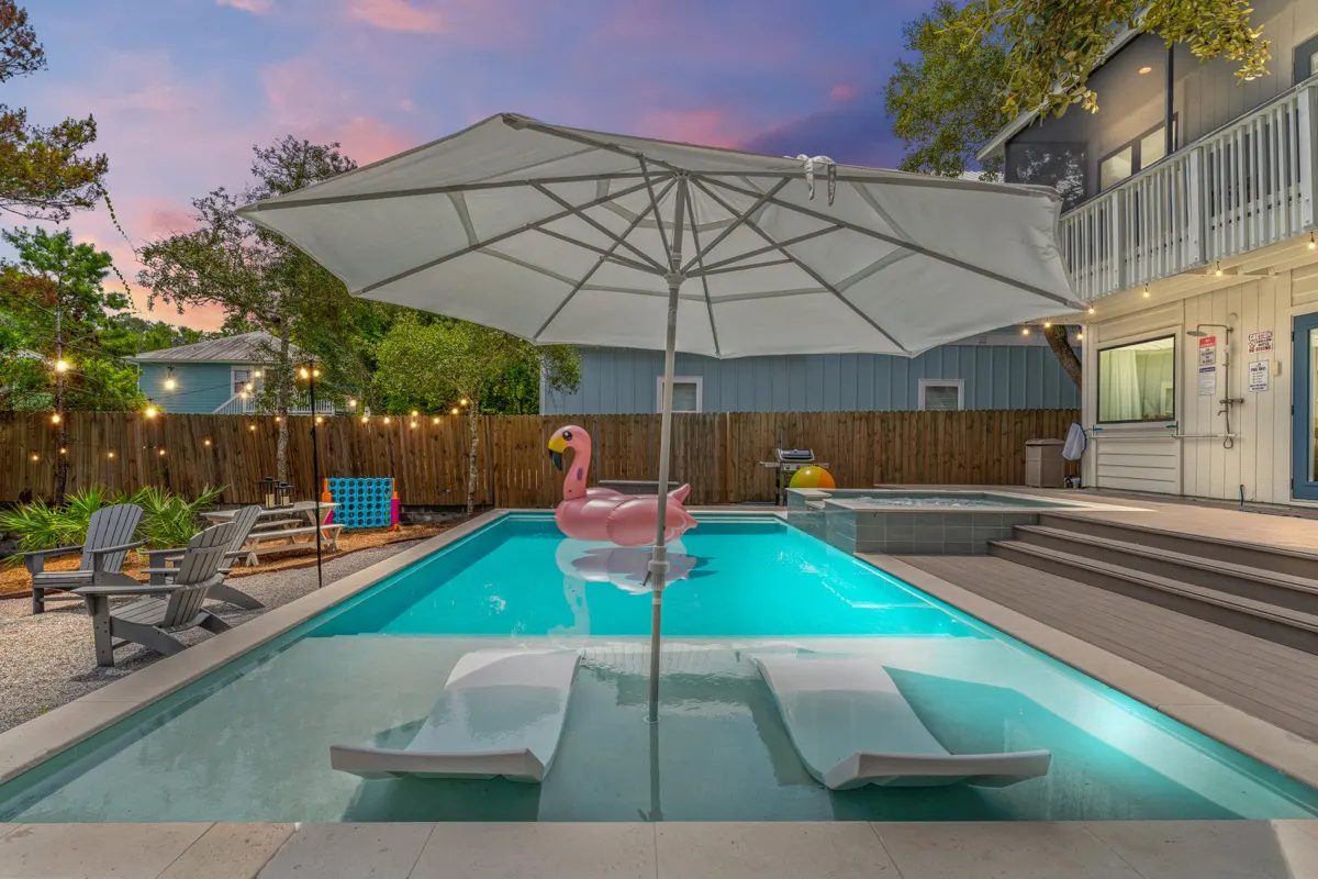 Pool chaises and tanning ledge with the right amount of shade
