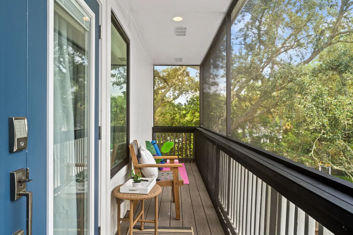 Private, screened-in balcony overlooking the pool and backyard