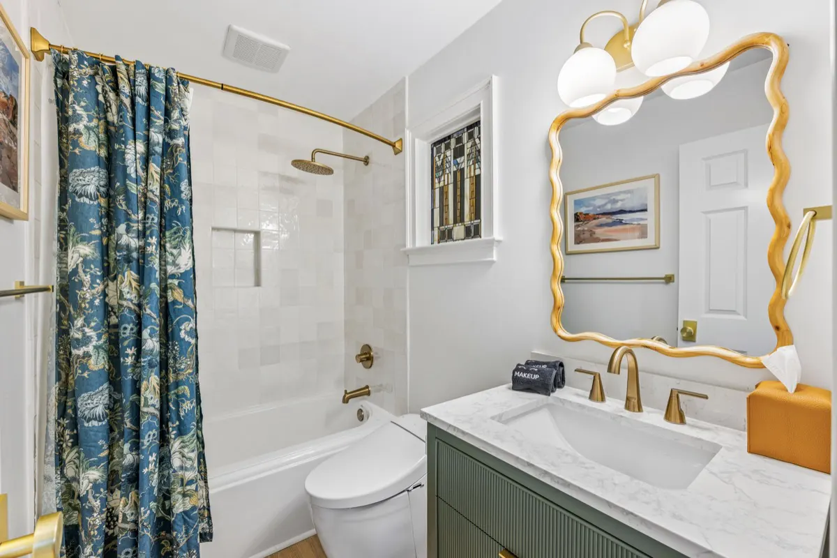 Ensuite bathroom featuring TOTO Smart Bidet and rain shower/bathtub